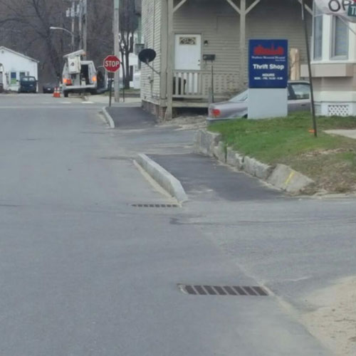 Dug Storm Drains, Installed Sidewalk, Installed Curbs, Paved on Danforth Street in Norway, Maine